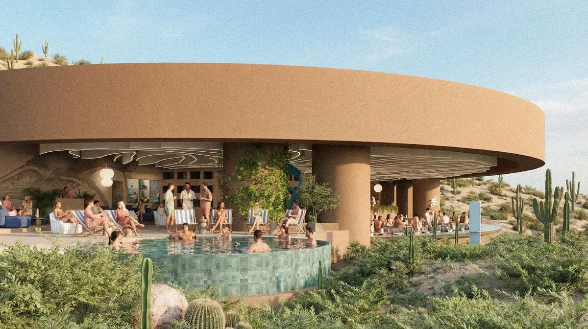 The Beach Club pavilion with guests by the pool