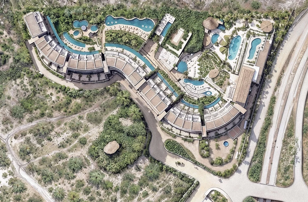 Illustrated DUNNA masterplan (brochure p.21): residences, the Live Aqua hotel, lagoons, pools and amenities